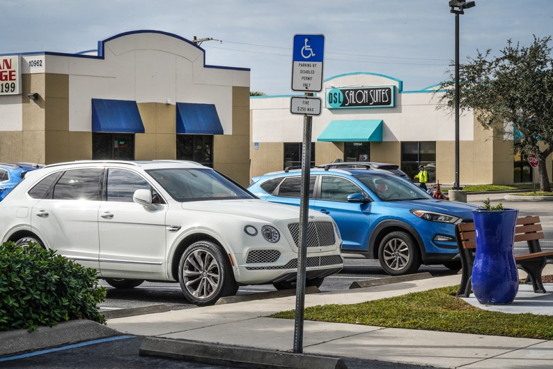 Dennis Church, Cars in Parking Lot with Big Blue Vase, Florida Dennis Church, Cars in Parking Lot with Big Blue Vase, Florida