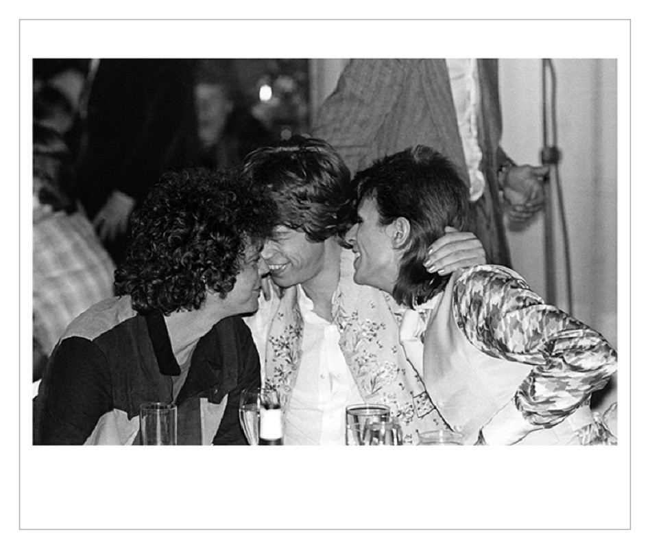 Mick Rock, Reed Bowie Jagger Hug Mick Rock, Reed Bowie Jagger Hug