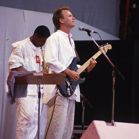 Photographie, Sting sur scène au concert "Live Aid", Wembley Stadium de Londres, 13 juillet 1985, Jacques Langevin