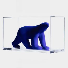 Resin statue of a Louis Vuitton seated bear ideal for fashion-addicts
