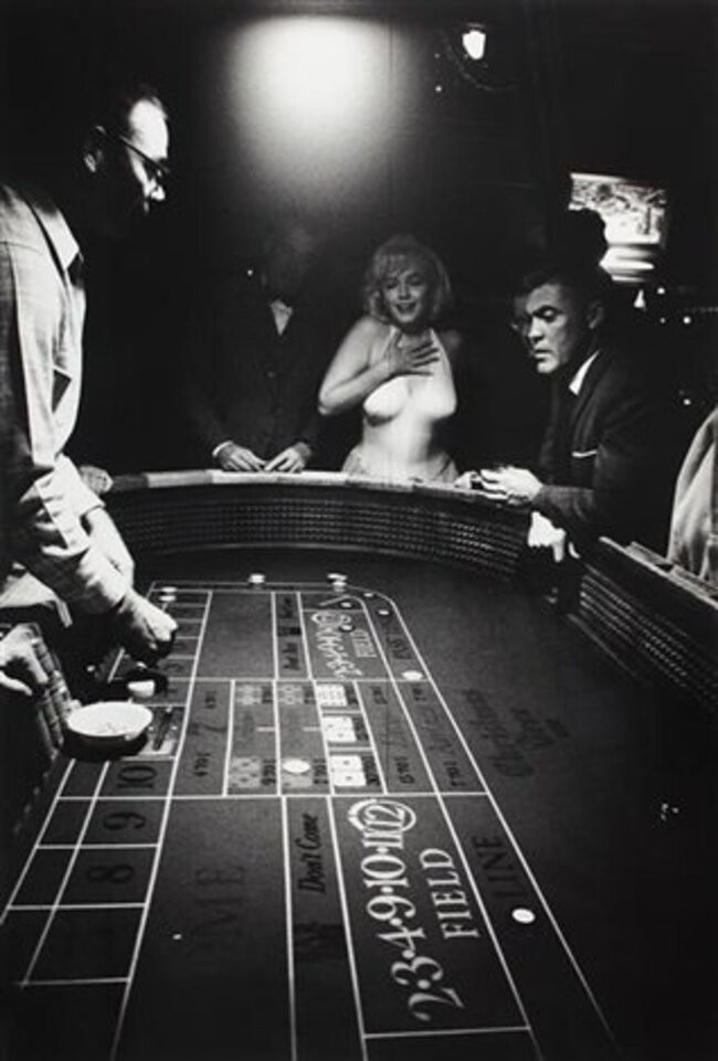 Eve Arnold, USA. Nevada. Reno. Marilyn's reaction to a lucky toss. Marilyn Monroe and John Huston. 1960 Eve Arnold, USA. Nevada. Reno. Marilyn's reaction to a lucky toss. Marilyn Monroe and John Huston. 1960