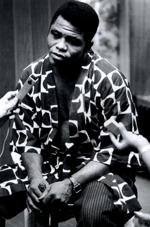 Eve Arnold, James Brown; singer, being interviewed after a concert in the Apollo in Harlem where the slogan Black is Beautiful was introduced. Eve Arnold, James Brown; singer, being interviewed after a concert in the Apollo in Harlem where the slogan Black is Beautiful was introduced.