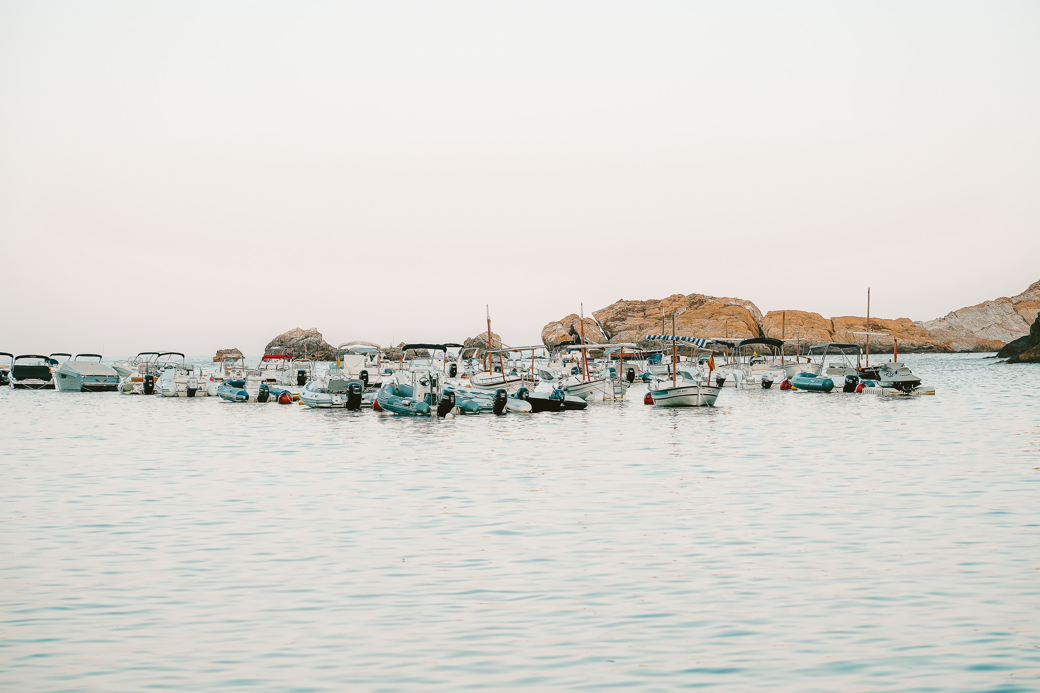 Arantza NT Photography, Boats resting in the tranquil waters of Begur Arantza NT Photography, Boats resting in the tranquil waters of Begur