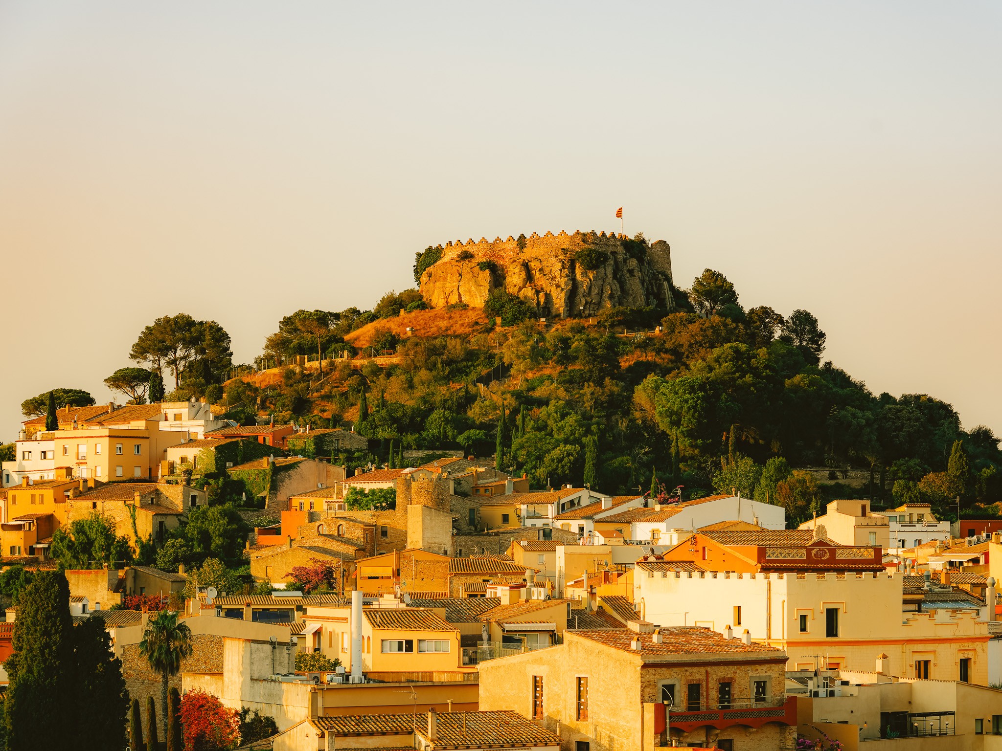 Arantza NT Photography, Golden Hour over the Historic Castle of Begur Arantza NT Photography, Golden Hour over the Historic Castle of Begur