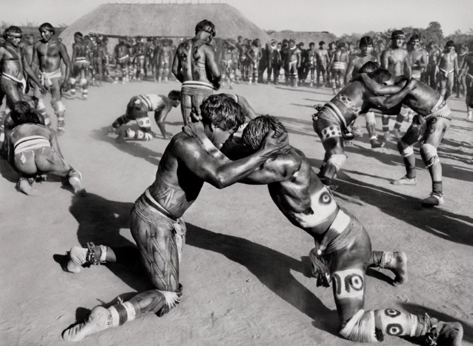 Sebastião Salgado, Warriors face off in huka-huka fight, Waurá Village, Xingu Indigenous Territory (M) Sebastião Salgado, Warriors face off in huka-huka fight, Waurá Village, Xingu Indigenous Territory (M)