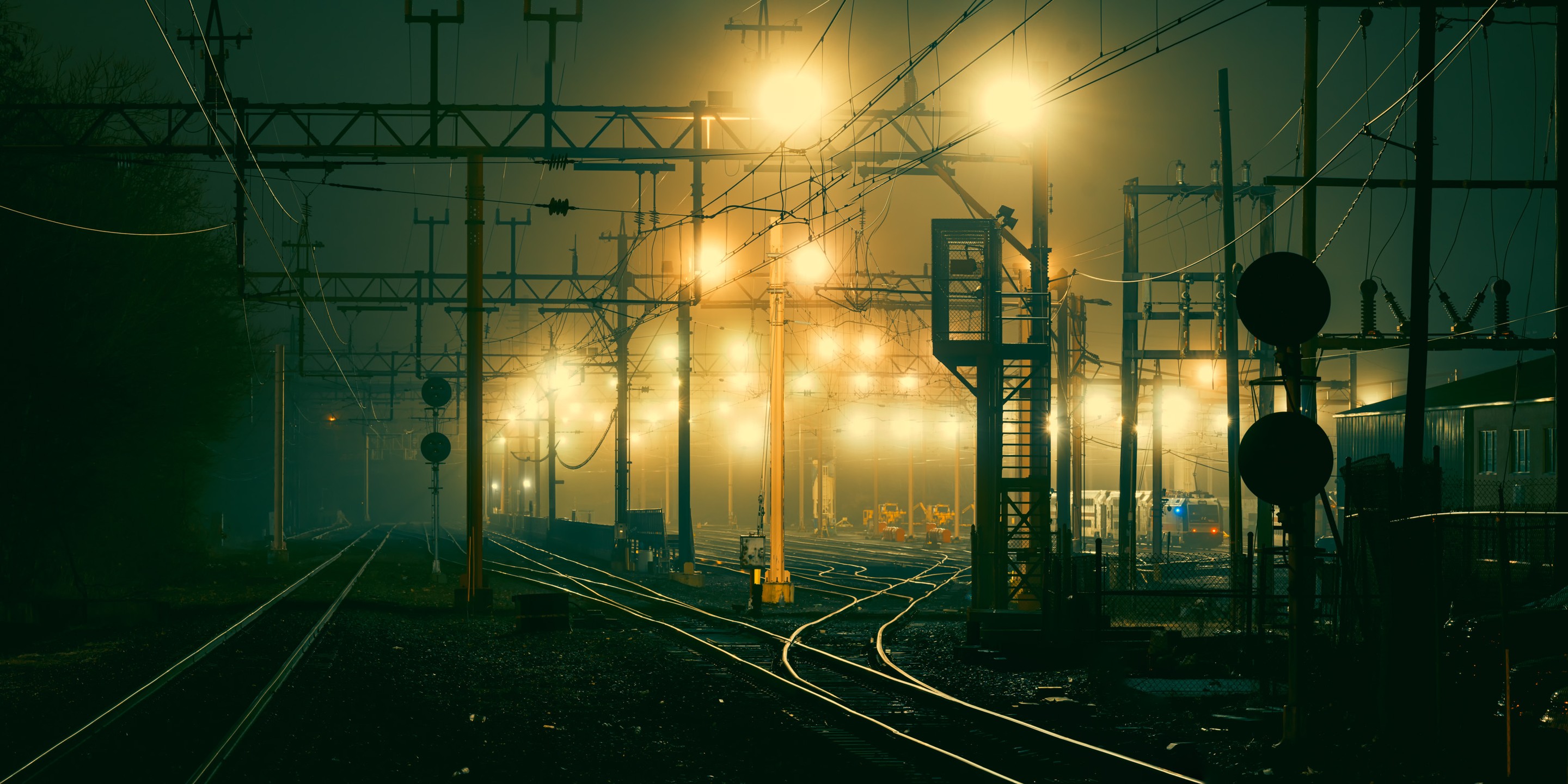 Beyti Barbaros, Train Station railways at a foggy night Beyti Barbaros, Train Station railways at a foggy night