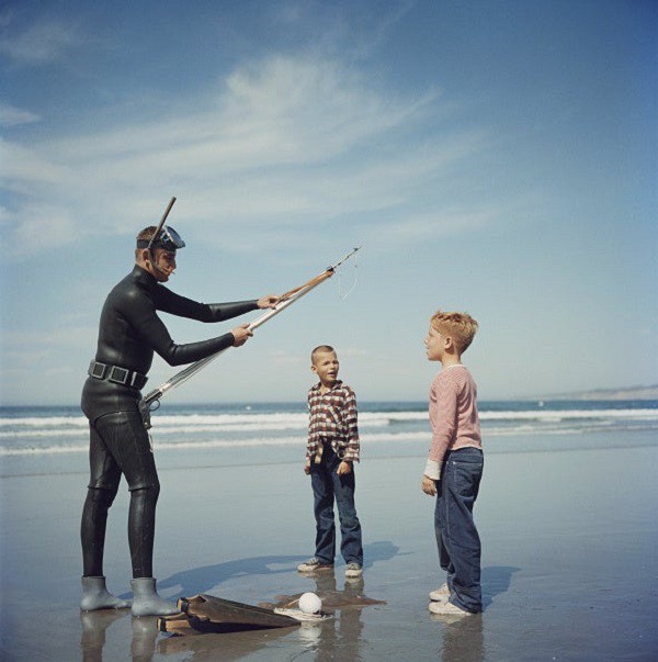 Slim Aarons, Spear Fishing In San Diego - 1956 Slim Aarons Limited Edition Estate Stamped Print Slim Aarons, Spear Fishing In San Diego - 1956 Slim Aarons Limited Edition Estate Stamped Print